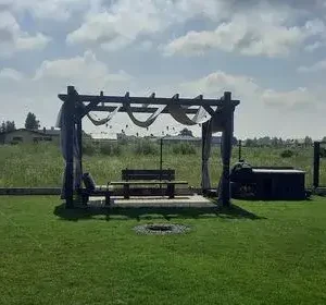 Pavėsinės lauko užuolaidos gamtoje